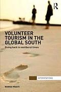 Volunteer Tourism in the Global South: Giving Back in Neoliberal Times