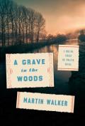 A Grave in the Woods: A Bruno, Chief of Police Novel