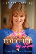 Touched by Love: Turning Crisis into a Blessing