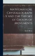 Mathematical Crystallography and the Theory of Groups of Movements