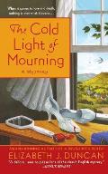 The Cold Light of Mourning: A Penny Brannigan Mystery