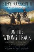 On the Wrong Track: A Holmes on the Range Mystery: A Western Mystery Series