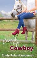 Caught Kissing the Cowboy: A Return to Snow Valley Romance