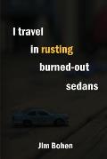 I travel in rusting burned-out sedans