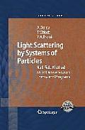 Light Scattering by Systems of Particles: Null-Field Method with Discrete Sources: Theory and Programs