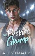 The Pucking Grump: An Enemies to Lovers Fake Dating Hockey Romance