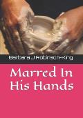 Marred In His Hands