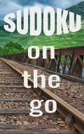 Sudoku On The Go: Sudoku Puzzles for Adults - Normal, Medium and Hard - Great Travel Size Book for Passing The Time